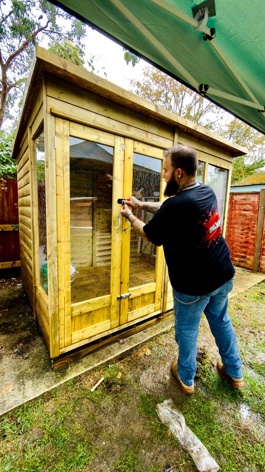 Man fixing shed - other works project by OddJobs in Kent